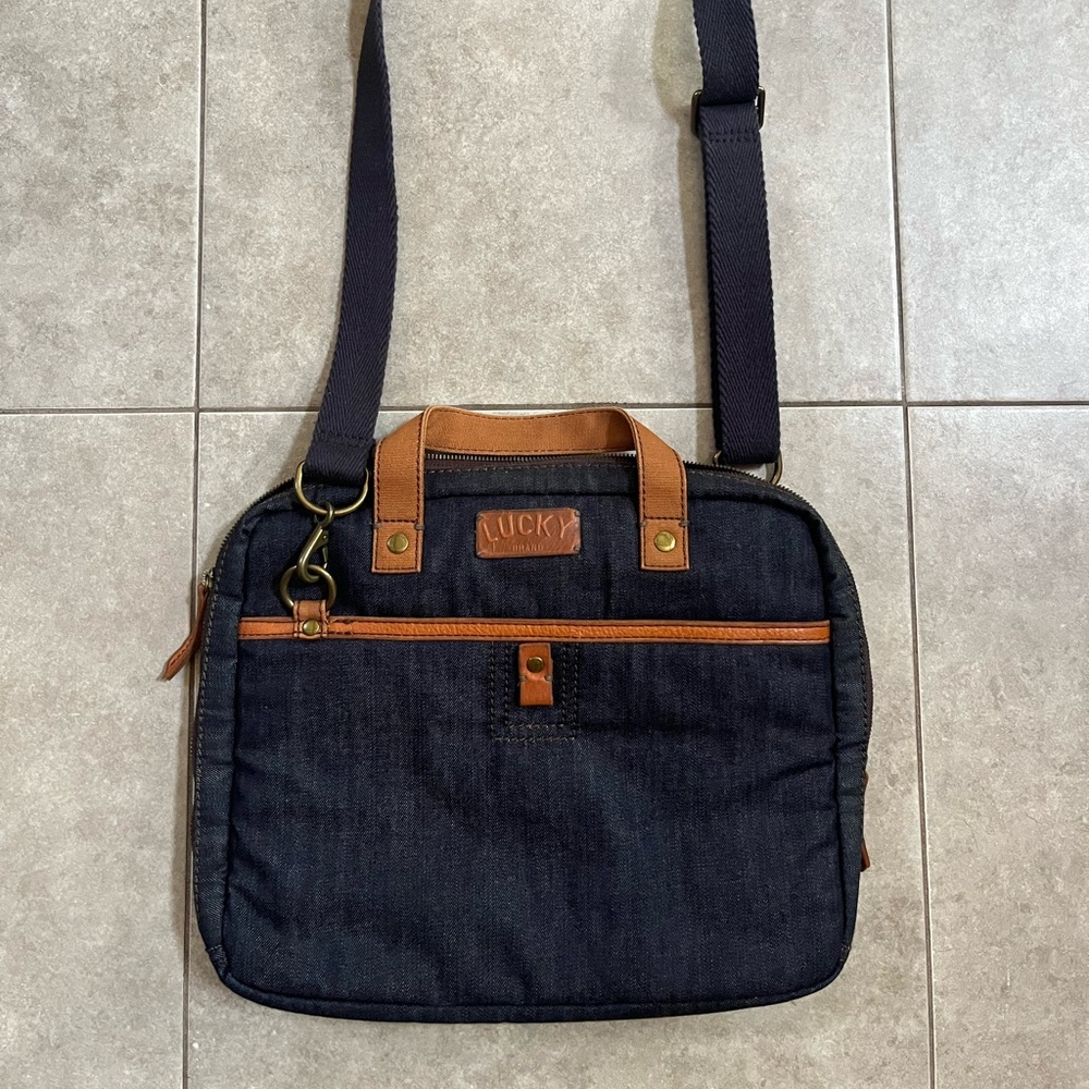 Lucky Brand Denim Business Travel Laptop School Crossbody Bag
Adjustable strap